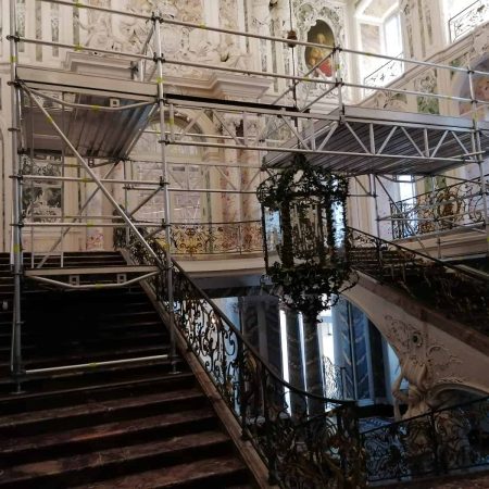 A staircase with scaffolding in a building.